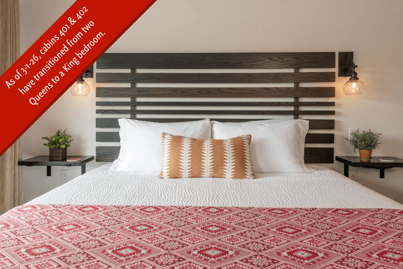 separate bedroom with one queen bed